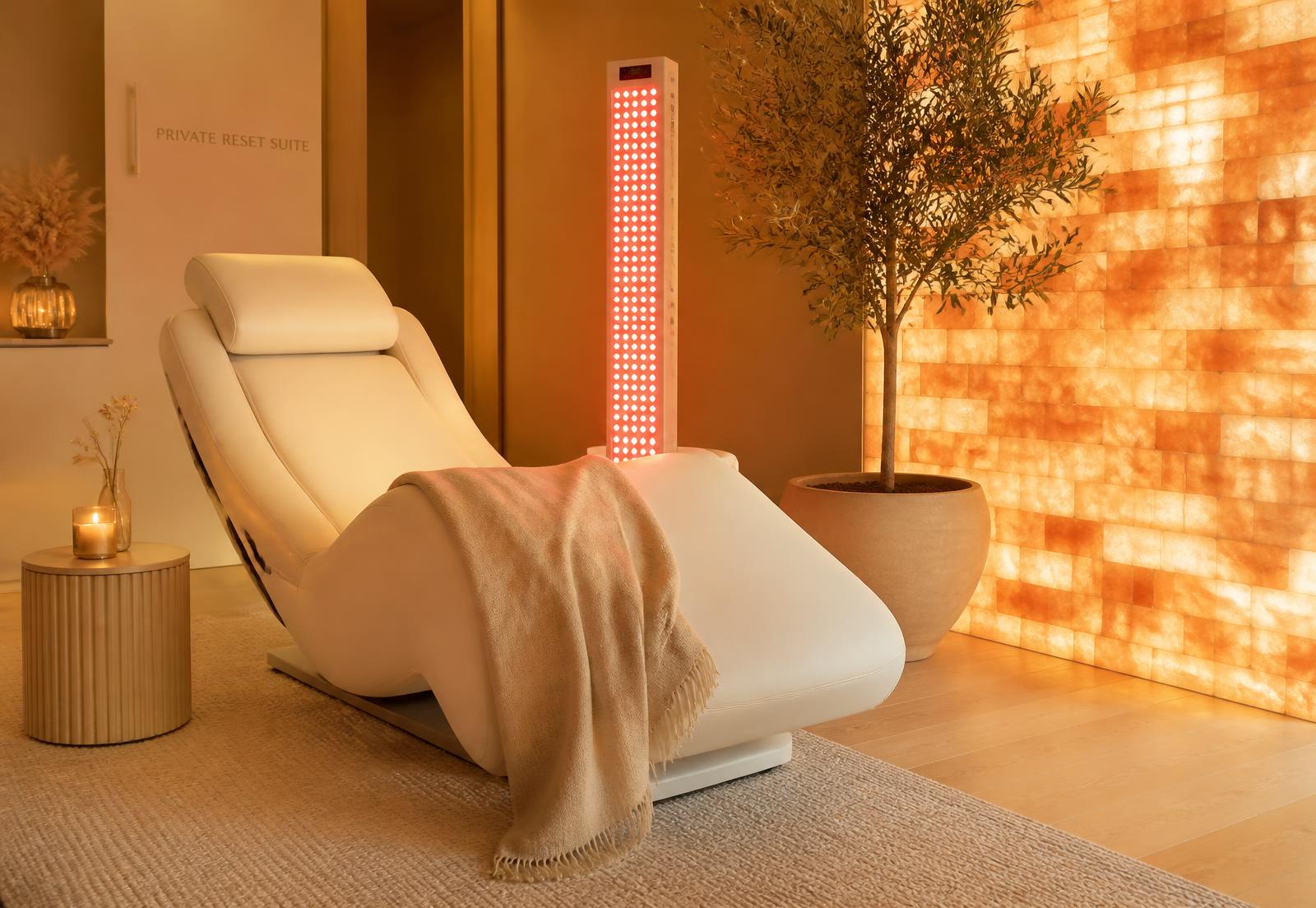 Soreva private reset suite with zero-gravity recliner and red light therapy panel